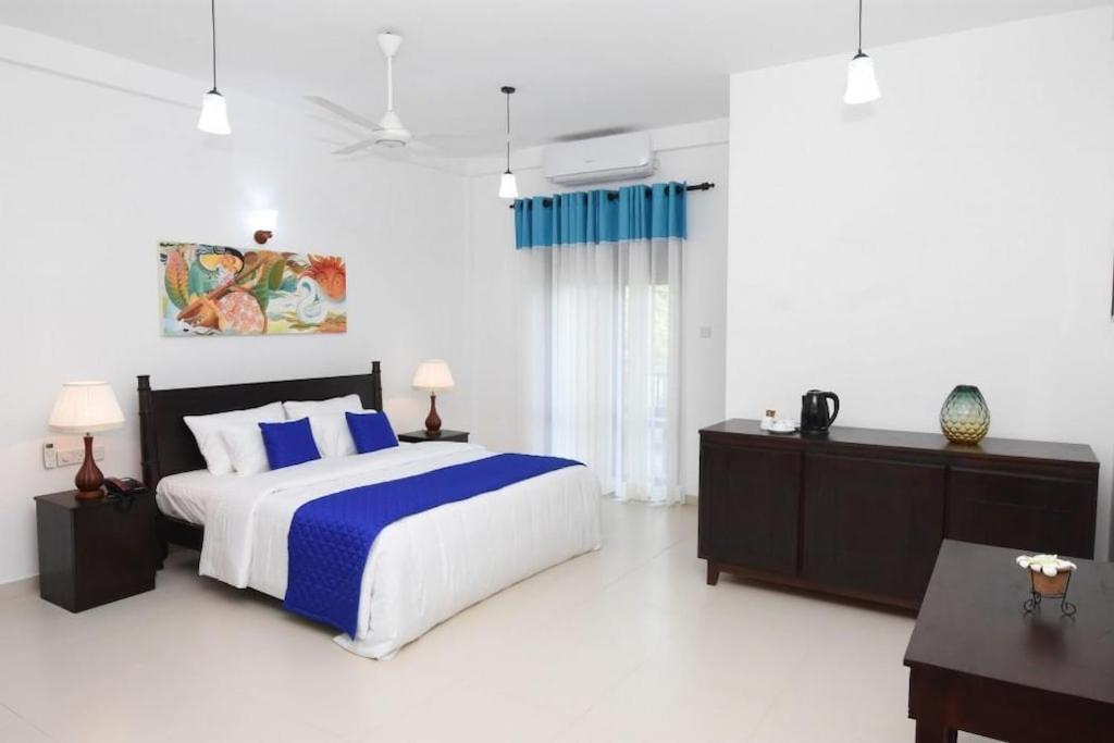Blue Spring Hotel Wadduwa Pokoj fotografie